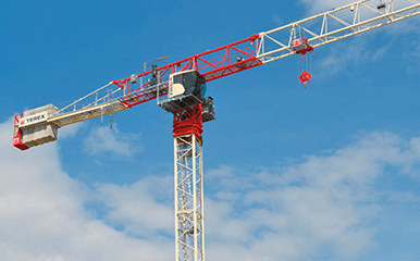 Terex Flat Top Tower Crane assembling steel framework on a jobsite