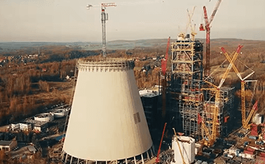 Terex Flat Top Tower Crane lifting beams at a USA construction site